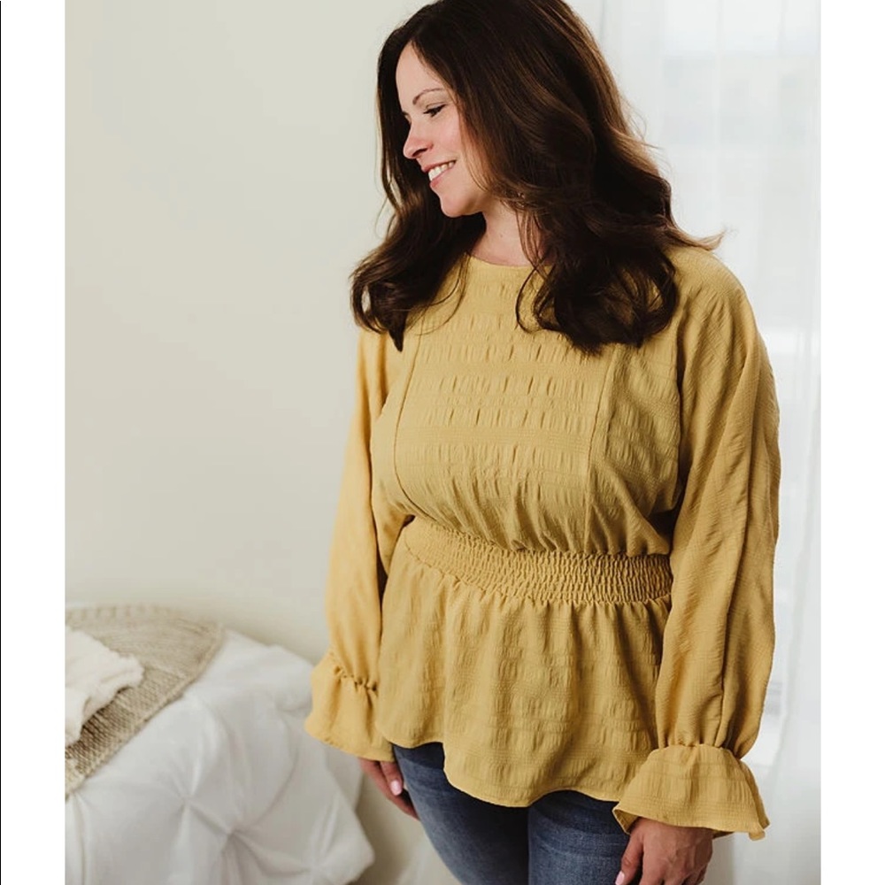 Brand new smocked sleeve yellow blouse